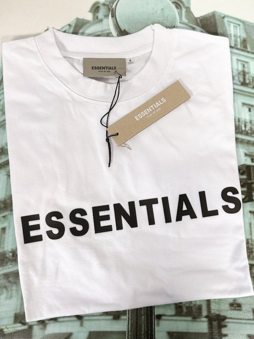 Fear of God Essentials Men’s Unisex Oversized Boxy Logo T‑Shirt, White on White